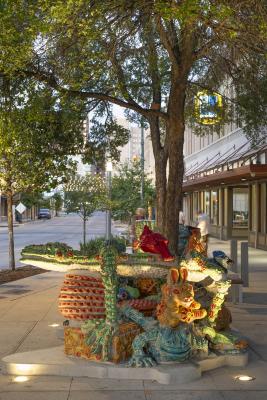 Sculptures constructed from artist-made clay bricks showcasing various animals, insects and native plants found in nearby San Pedro Creek; one sculpture has a composition of geometric forms while the other is fully-formed and exaggerated in scale